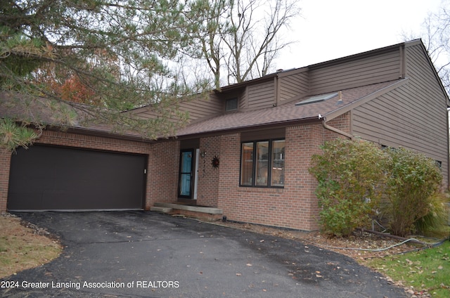 view of front of property with a garage