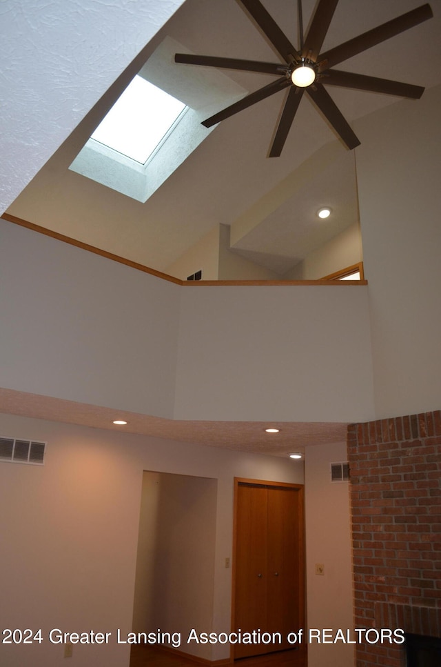 room details with a skylight and ceiling fan