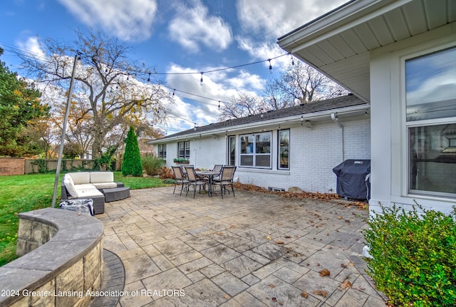 view of patio featuring outdoor lounge area and grilling area