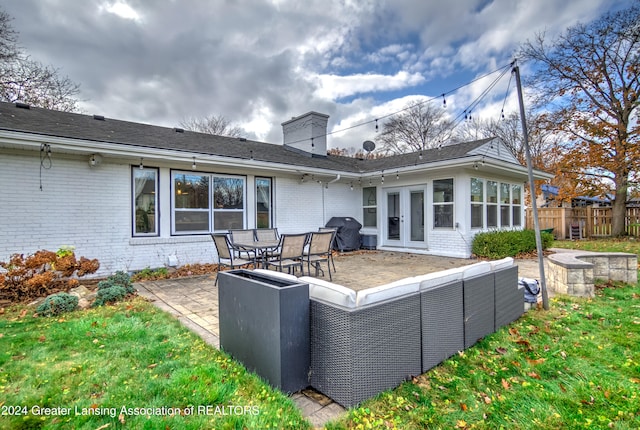 back of house featuring a patio area