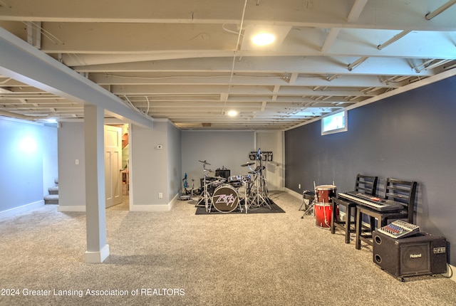 basement with light colored carpet