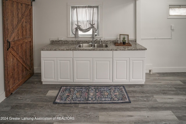 bathroom featuring vanity and hardwood / wood-style flooring