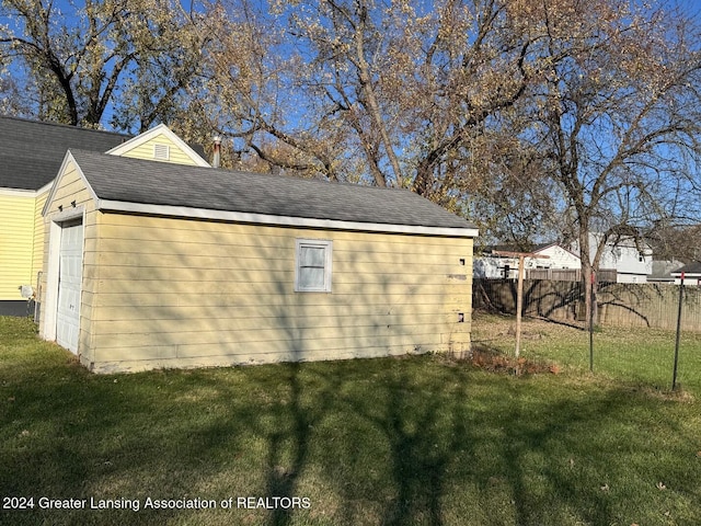 view of home's exterior with a yard