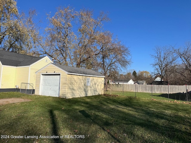 view of yard with a garage