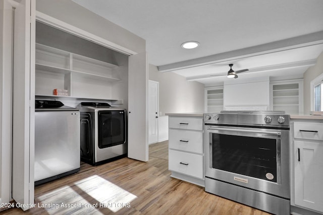 kitchen featuring white cabinetry, stainless steel electric range oven, separate washer and dryer, light hardwood / wood-style flooring, and beamed ceiling