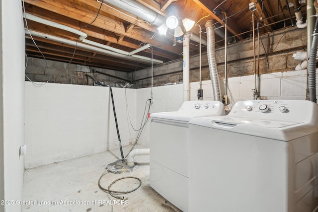 laundry area featuring laundry area and washing machine and dryer