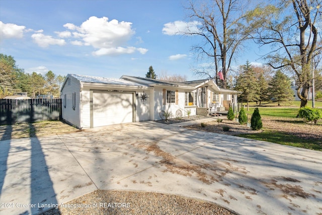 single story home with a garage