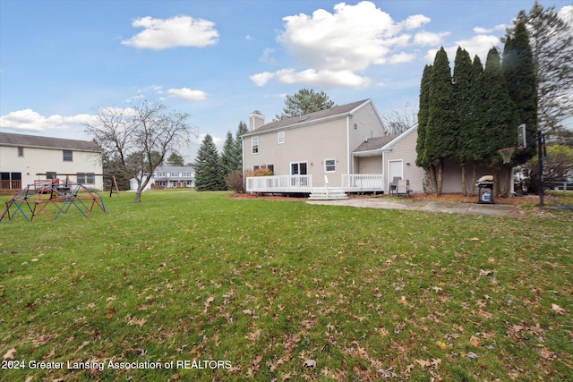 view of yard featuring a deck