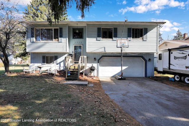 bi-level home featuring a garage