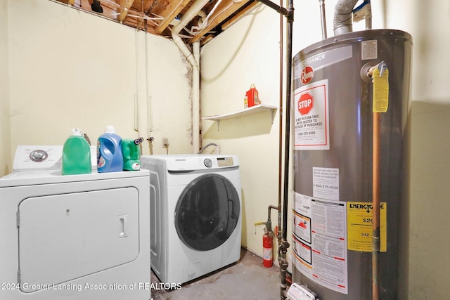 washroom featuring separate washer and dryer and water heater