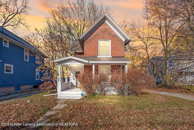 front of property featuring a porch