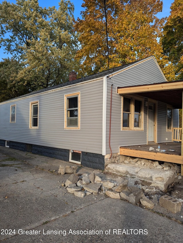 view of home's exterior featuring a porch