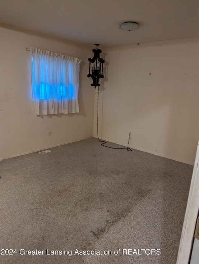 view of carpeted spare room