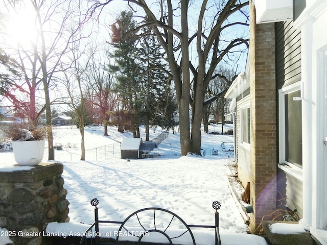 view of yard covered in snow