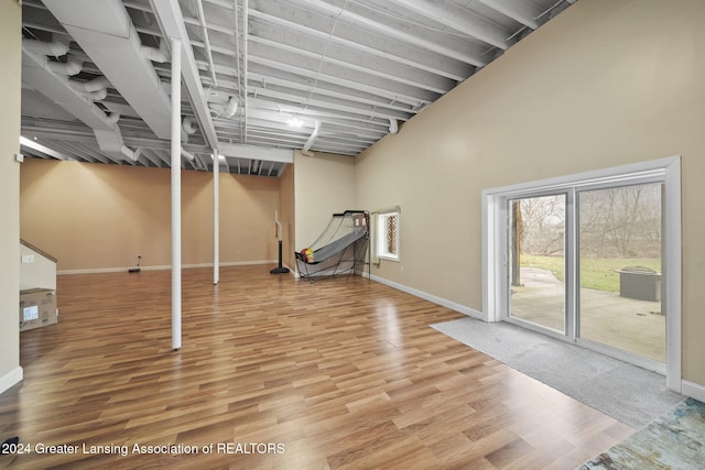 basement with wood-type flooring