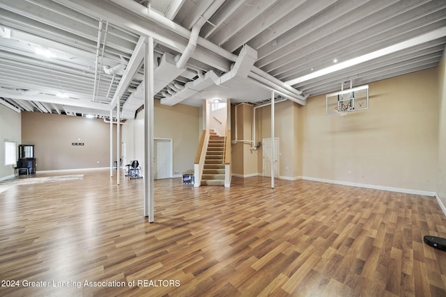 basement with wood-type flooring