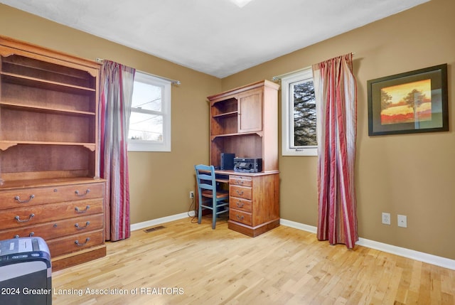 office area with light wood-type flooring