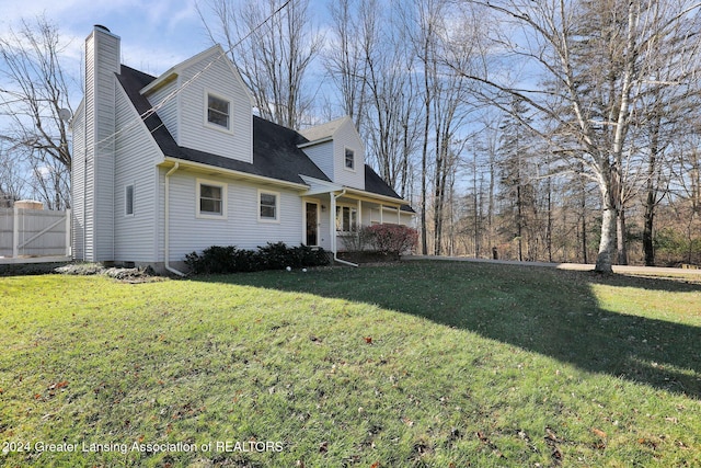 exterior space featuring a yard and a porch