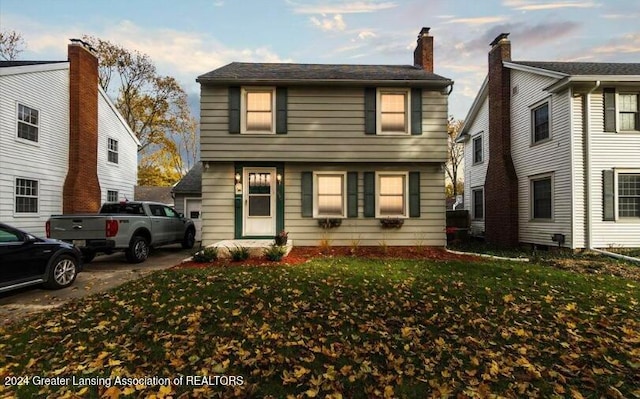 view of front facade with a front lawn