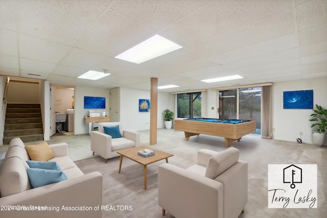 recreation room with a paneled ceiling, sink, and pool table