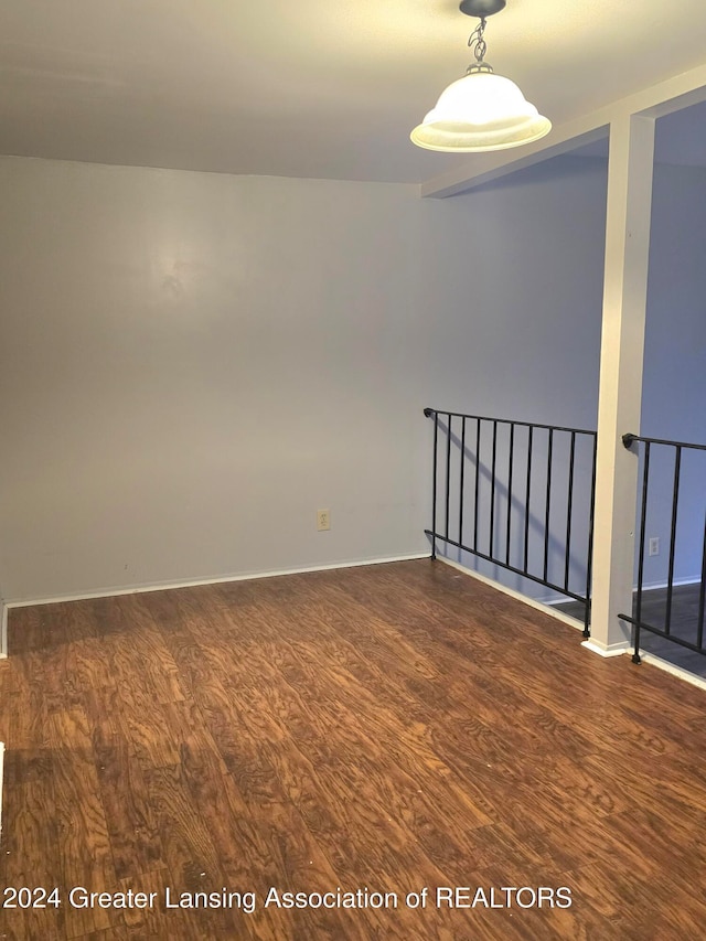 empty room featuring dark hardwood / wood-style floors