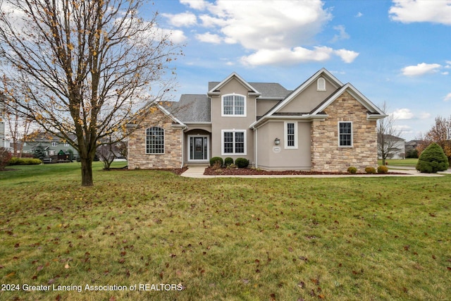 view of front of property featuring a front lawn