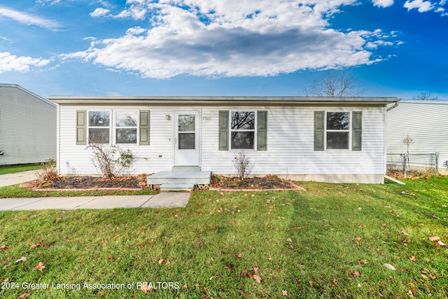 view of front of home with a front lawn