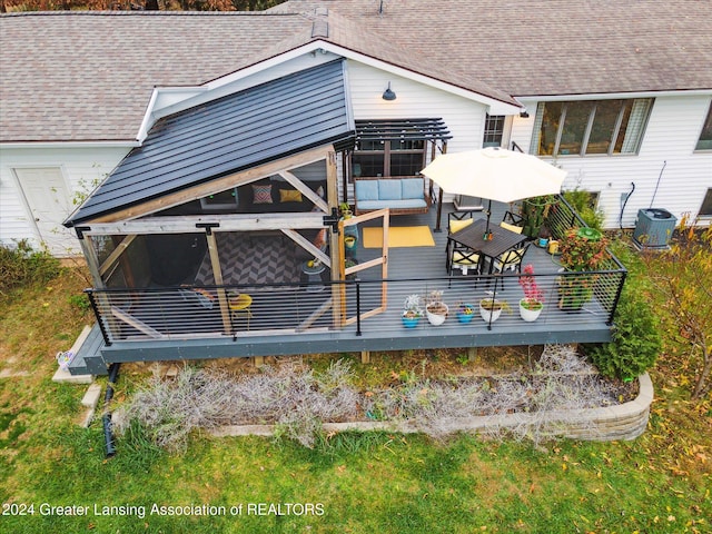 back of house featuring an outdoor hangout area and a wooden deck