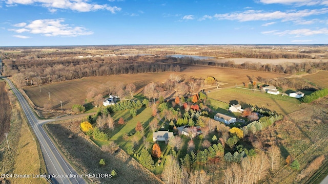 birds eye view of property featuring a rural view