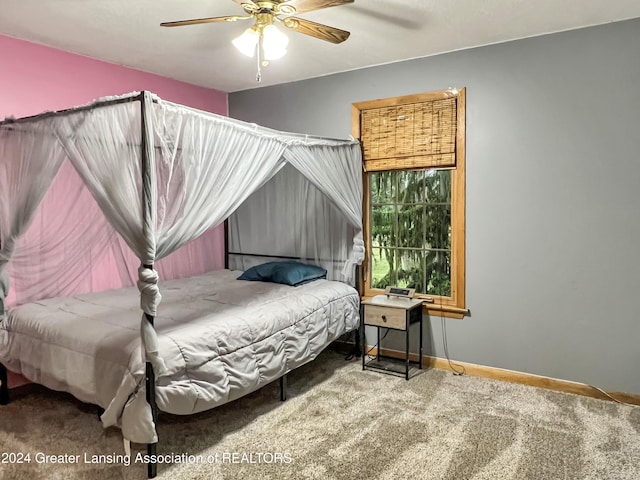 carpeted bedroom with ceiling fan