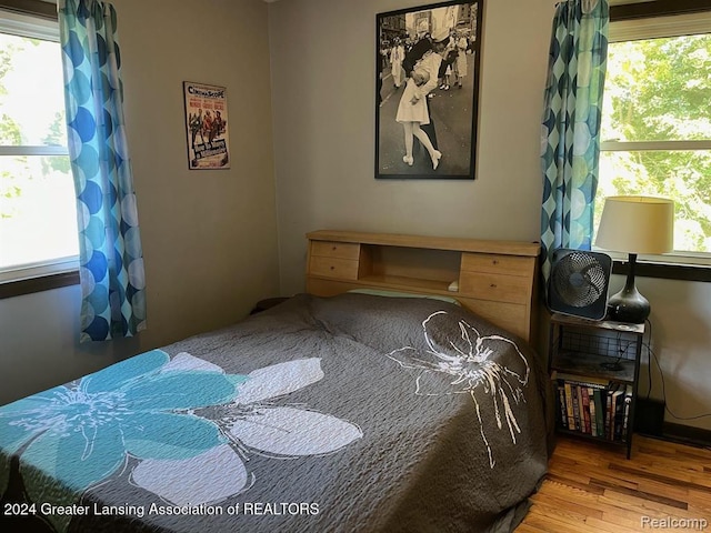 bedroom with wood-type flooring