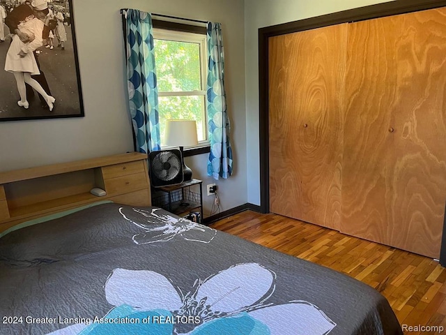 bedroom with wood-type flooring