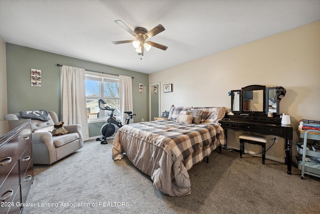 carpeted bedroom with ceiling fan