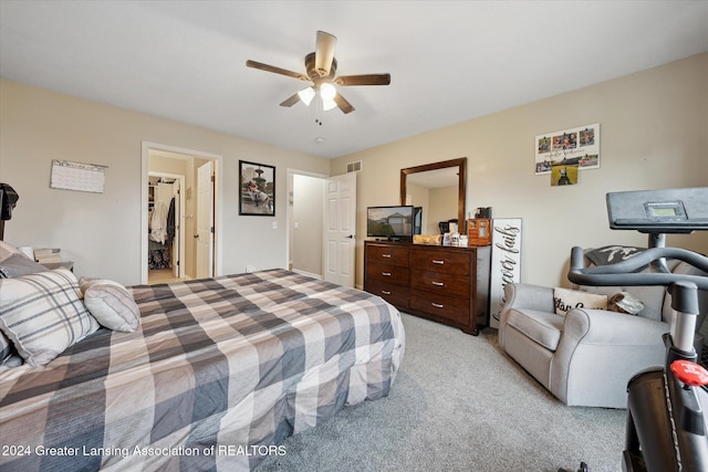 carpeted bedroom featuring ceiling fan