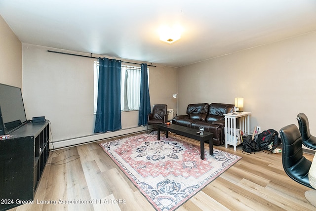 living room featuring hardwood / wood-style floors and a baseboard radiator