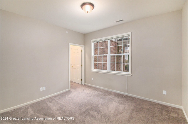 view of carpeted spare room