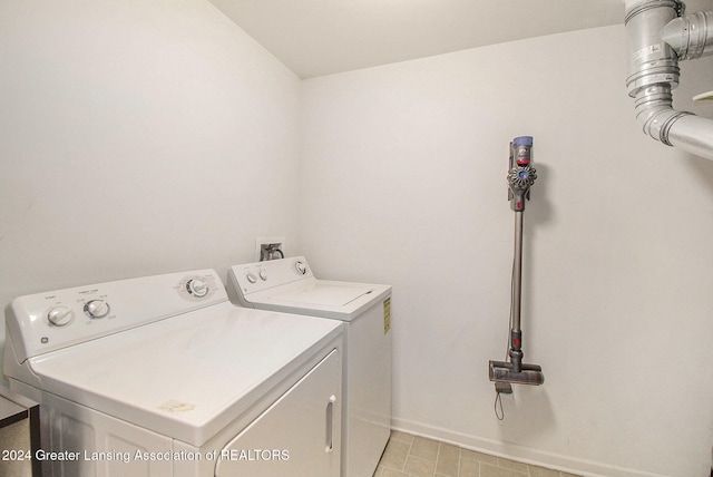 washroom featuring separate washer and dryer