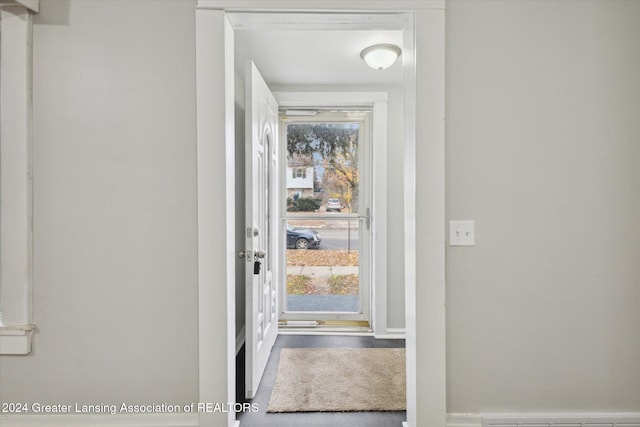 doorway to outside featuring a wealth of natural light