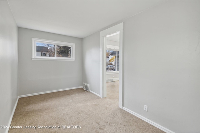 view of carpeted spare room