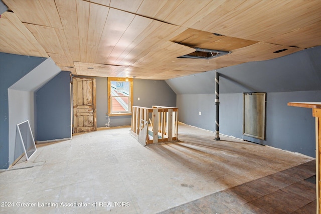 additional living space featuring wood ceiling and vaulted ceiling