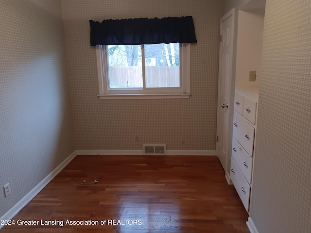 spare room with hardwood / wood-style floors