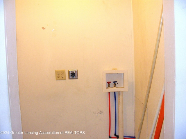 laundry room with hookup for a washing machine and hookup for an electric dryer