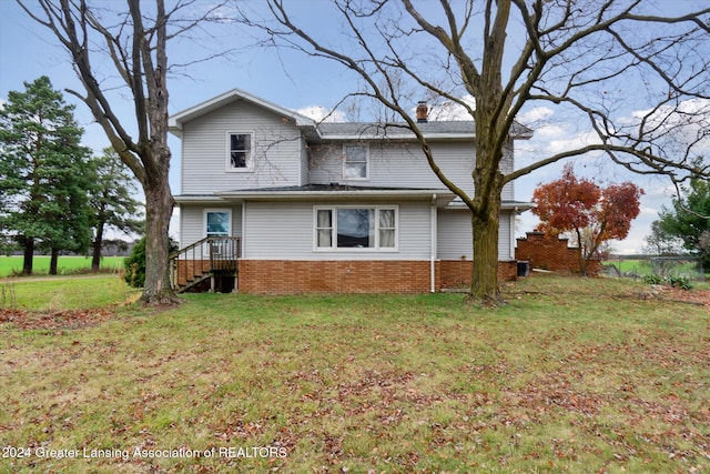 view of property exterior with a lawn