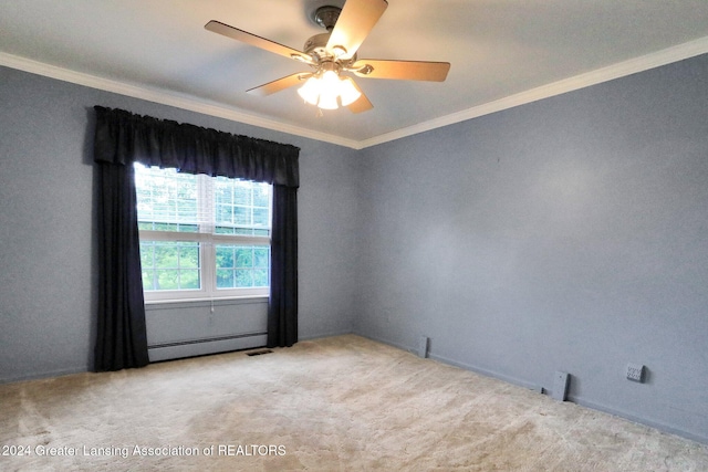 carpeted spare room with ceiling fan, ornamental molding, and a baseboard heating unit