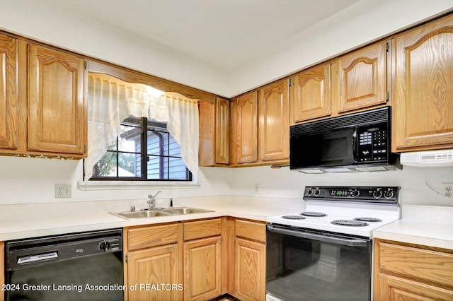 kitchen with sink and black appliances