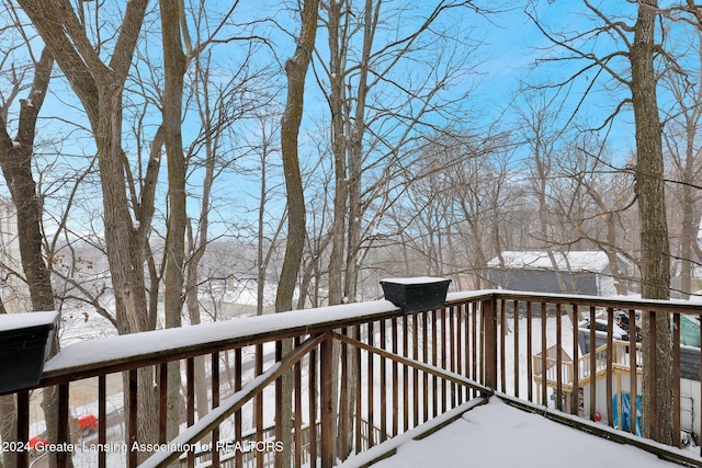 view of snow covered deck