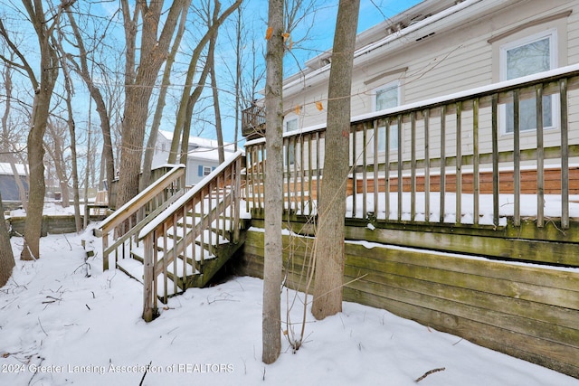 view of snow covered deck