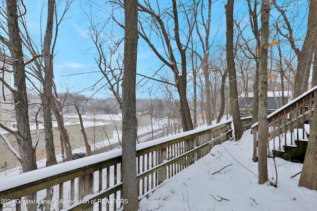 view of snow covered deck