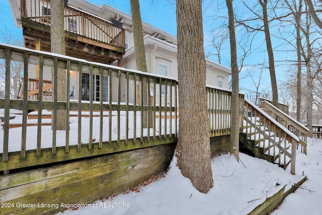 view of snow covered deck