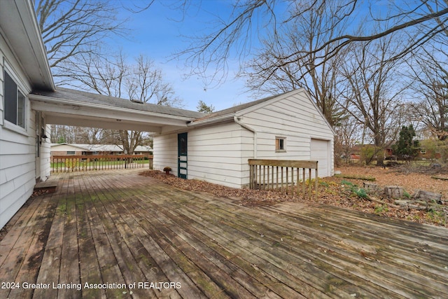 wooden terrace with a garage